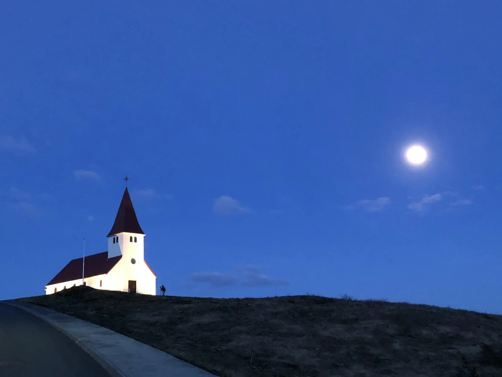 Coming back from the trigger faster each time. That's the whole skill. A church at dusk in Iceland, on repair and returning in relationships, Love Unlocked.