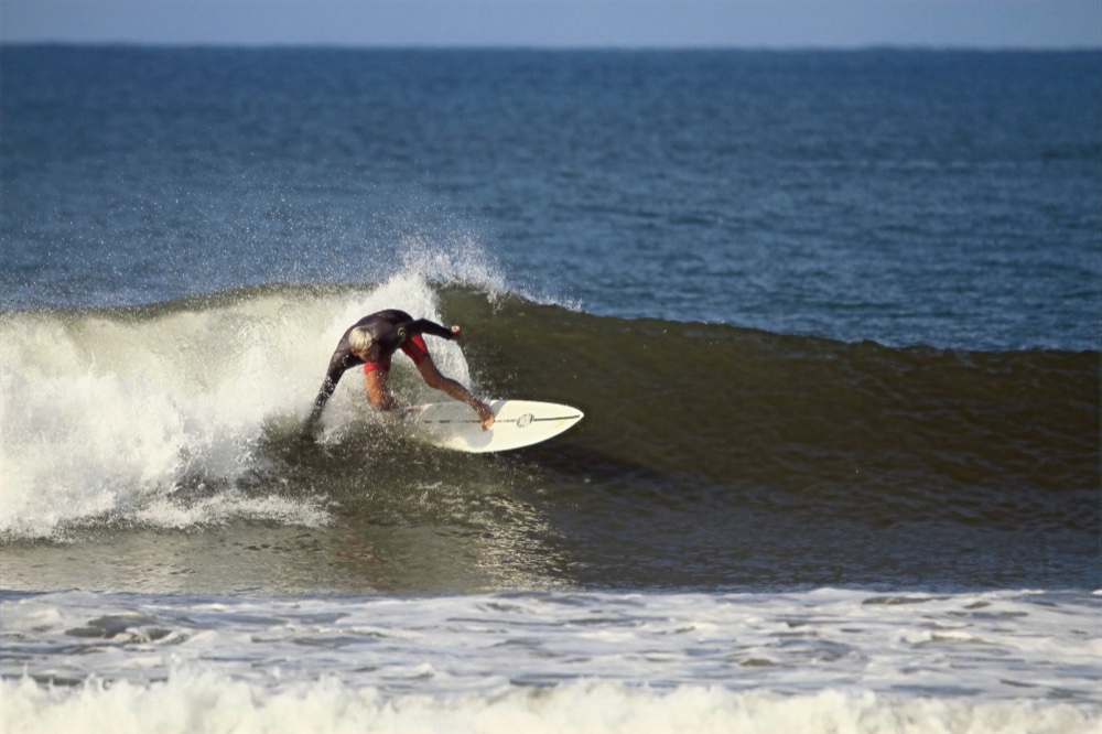 Rob and I surfing Medewi, Bali