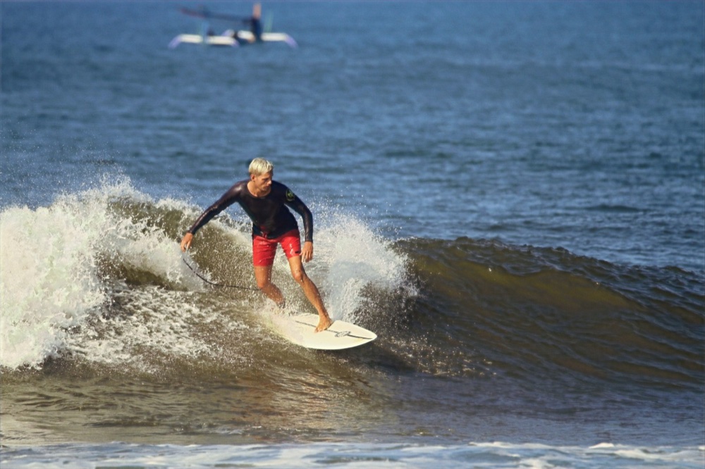 Rob and I surfing Medewi, Bali